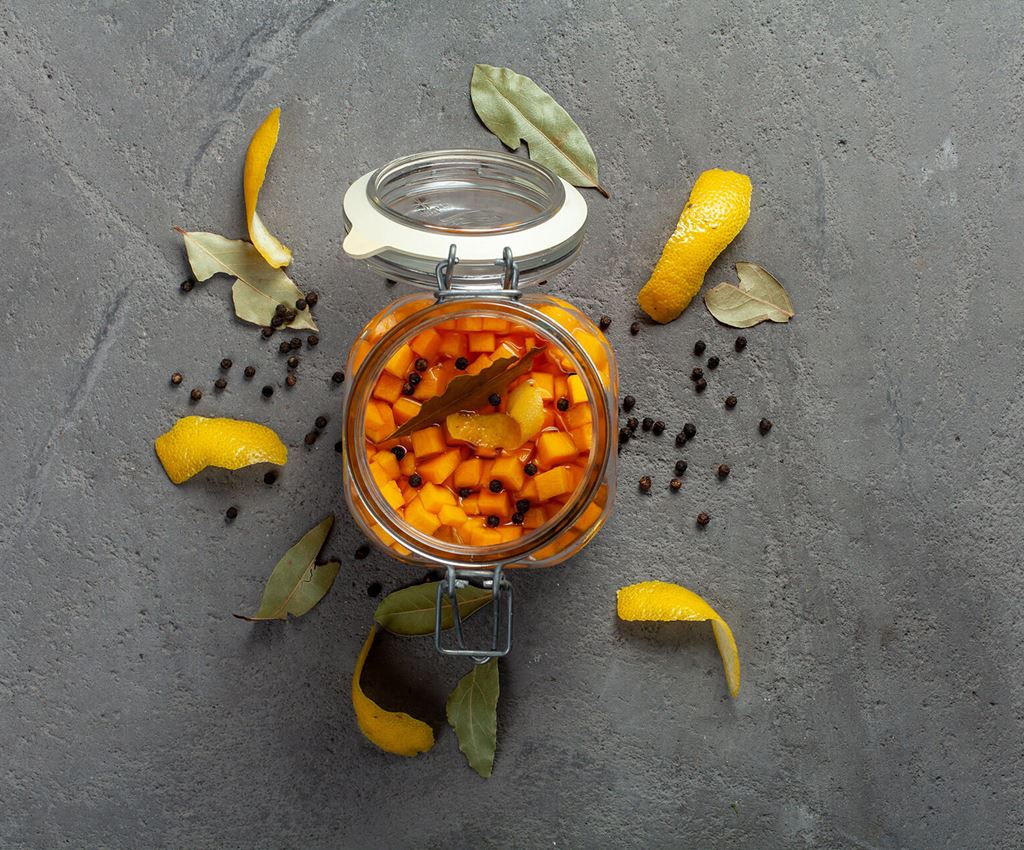 Glass jar with pickled butternut squash