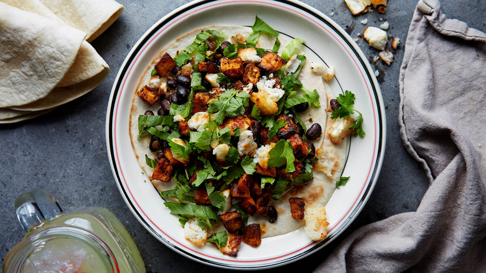 sweet-potato-taco-with-black-chipotle-beans-and-roasted-goat-cheese.jpg