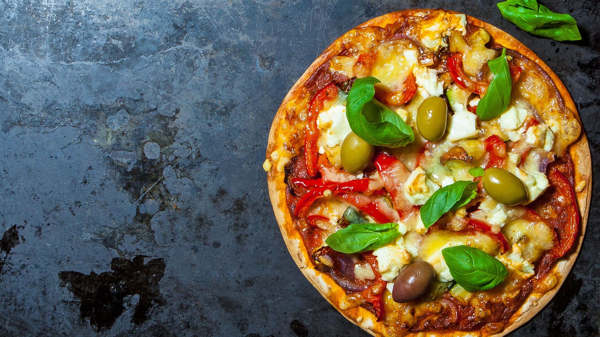 3 pizza's met toppings en groenten