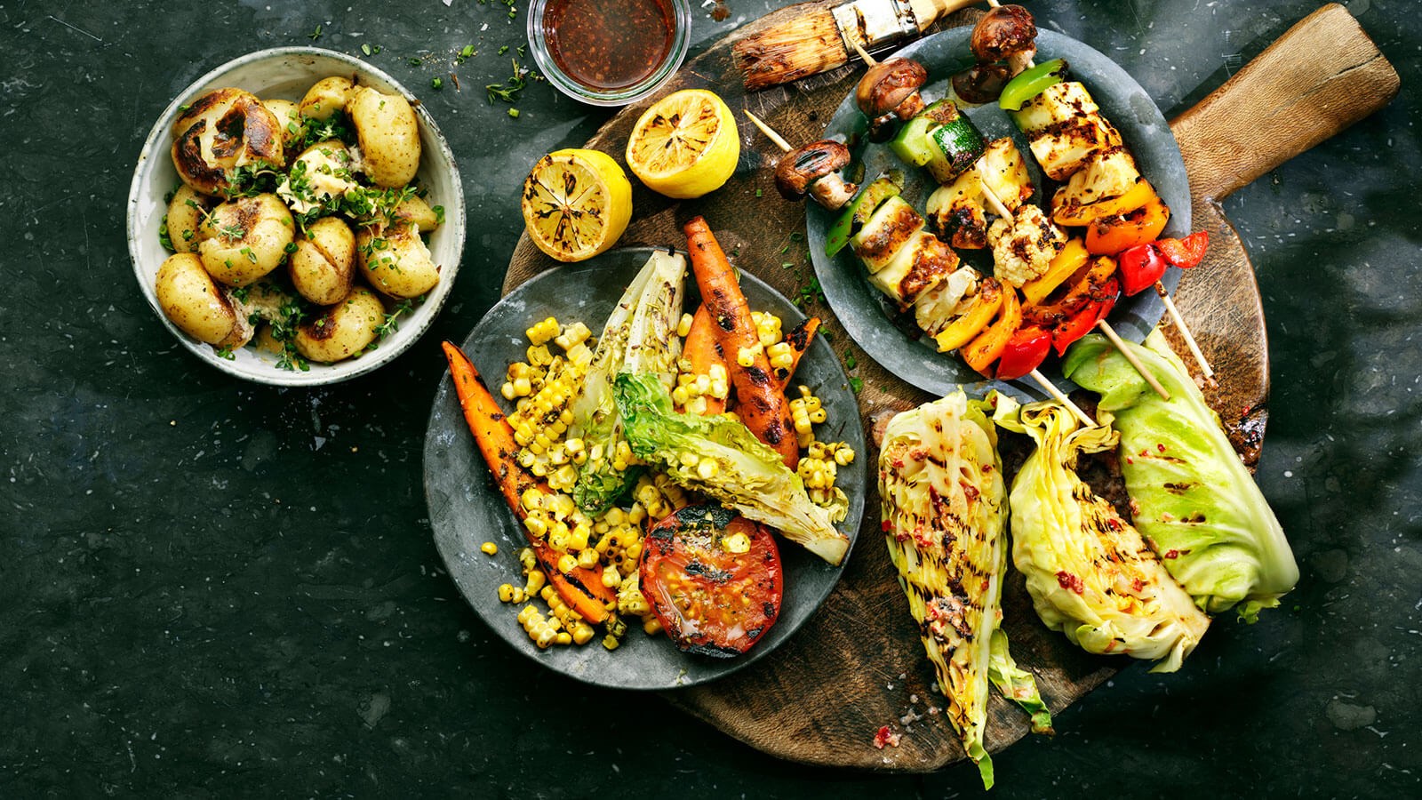 Four types of grilled sides - potatoes, veggies and kale