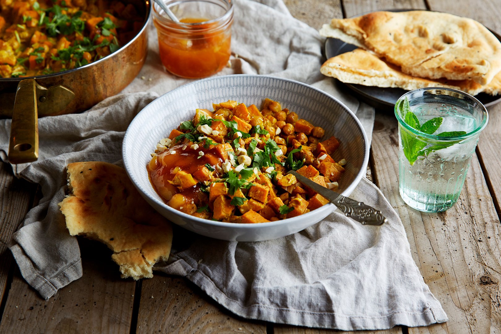 Sweet potato curry with cashews in a bowl