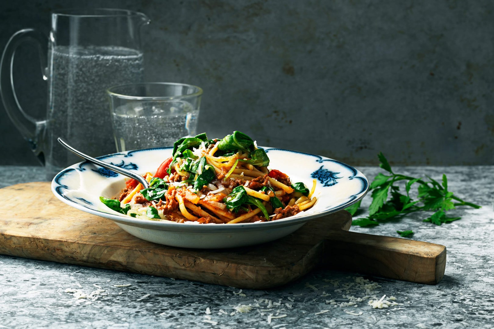 Bolognese with spinach on a plate