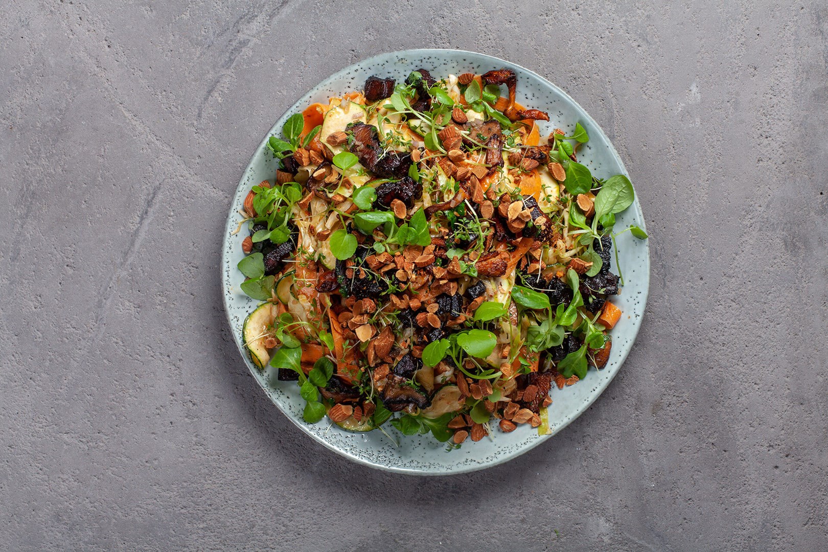 Plate with cabbage salad with pork belly