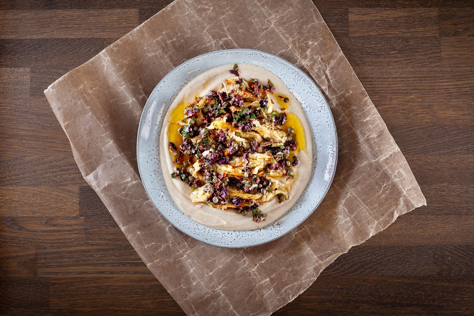 Jerusalem artichoke puree topped with oven-baked eggplant and vinegar