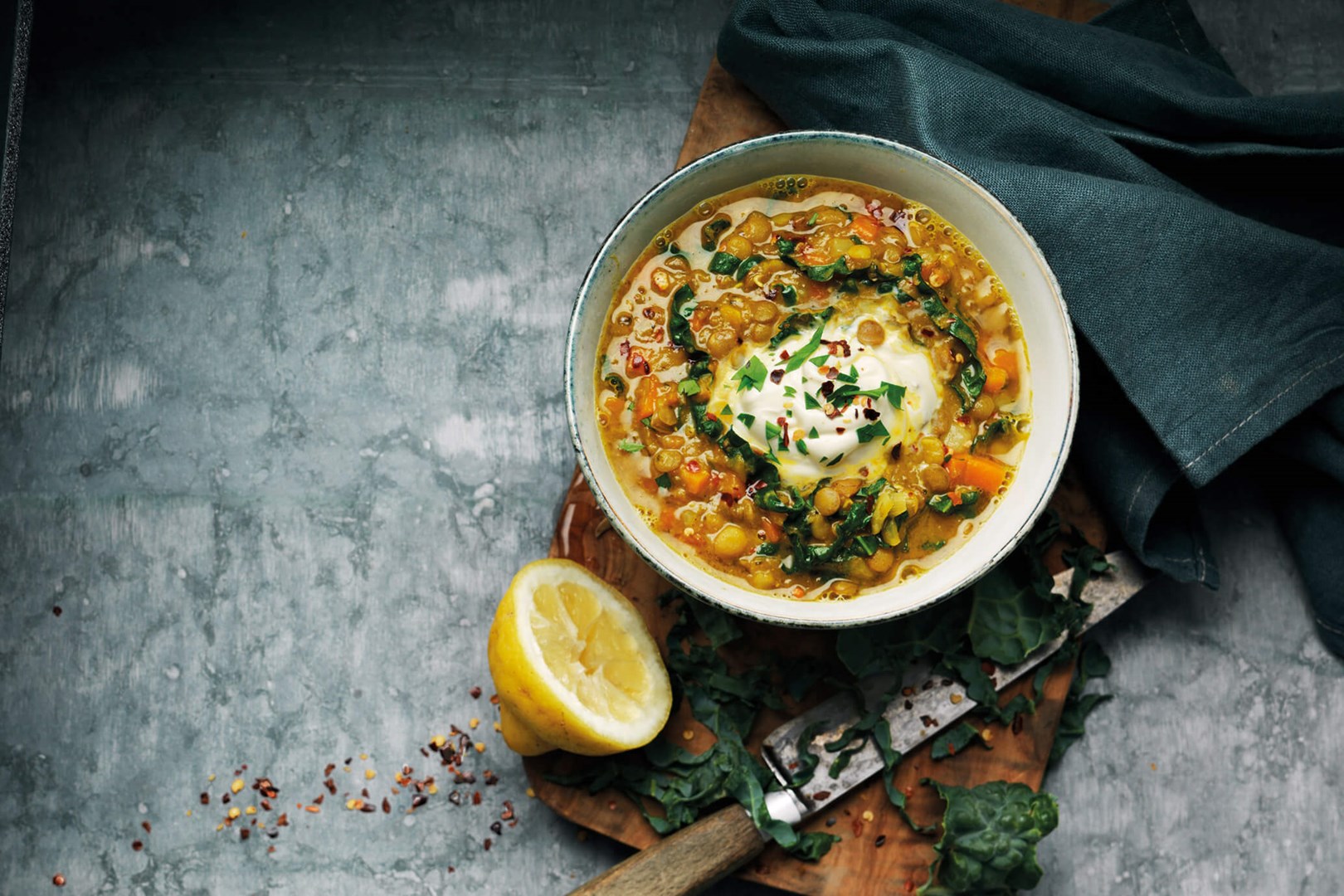 Lentil soup with crème fraiche in a bowl