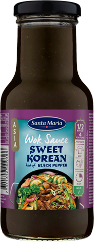 En flaska med söt koreansk wok-sås med smak av svart peppar