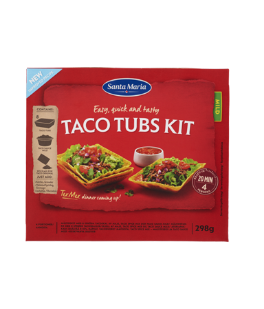 En färdig förpackning med tacoskal, kryddmix och tacosås.