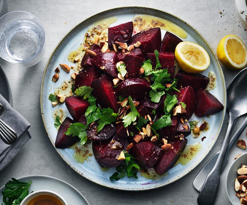 Beetroots with browned spicy butter topped with roasted almonds
