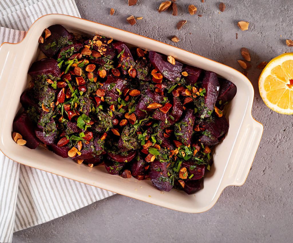 Beetroots with browned spicy butter topped with roasted almonds