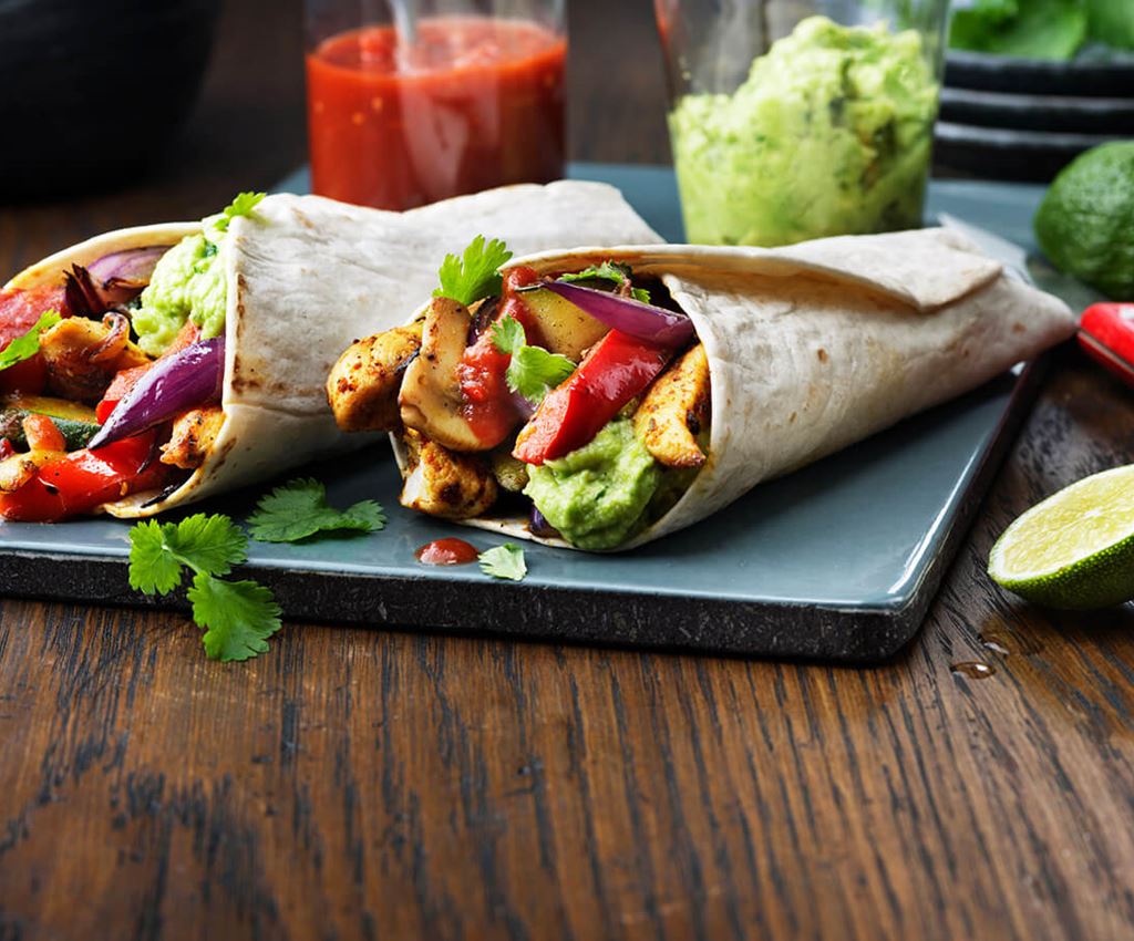 Fajita wraps with chicken and lots of vegetables