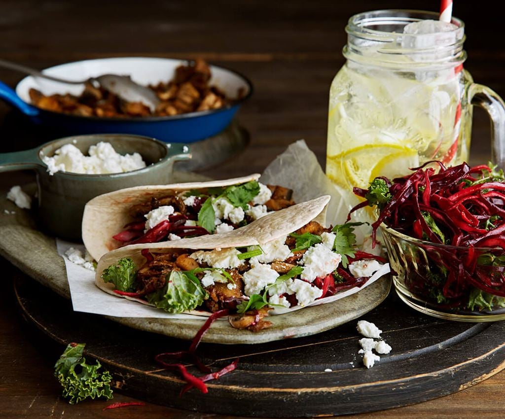 Mushroom tacos served with chipotle kale