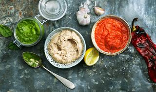Bowls with three different sauces that goes along well with BBQ