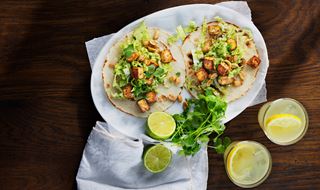 Two tofu tacos on a plate